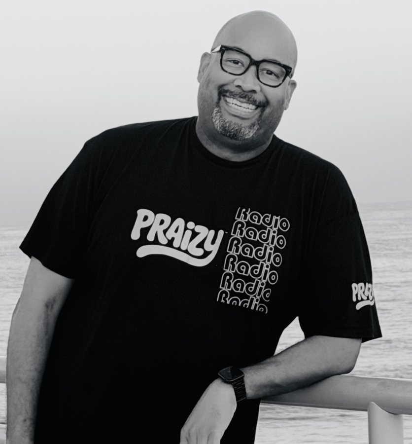 Ren Young on a pier, black and white.